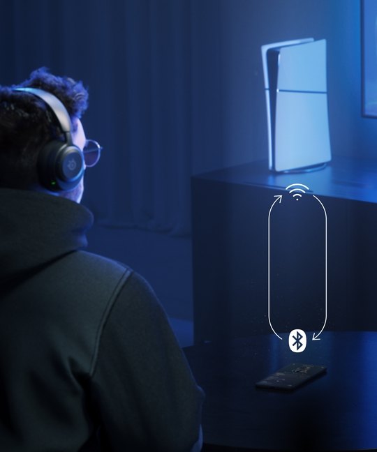 Image of a person playing games wearing the Arctis Nova 5 headset.