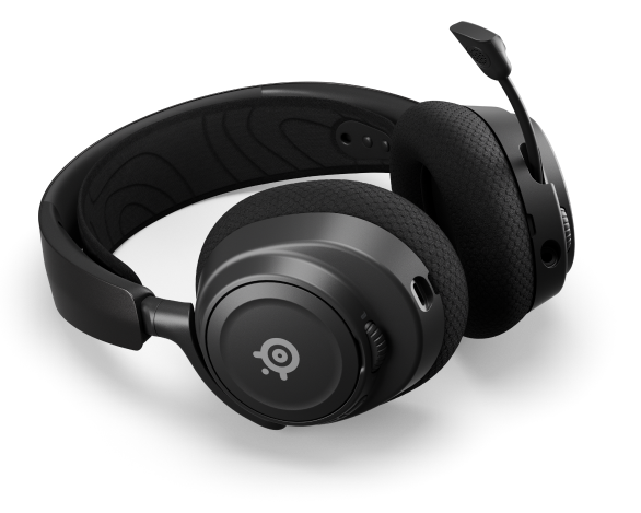 
 An Arctis Nova headset laying on a surface with the mic extended.
 